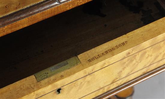 An early Victorian birds-eye maple writing table, by Holland & Sons, W.3ft 6in. D.2ft H.2ft 5in.